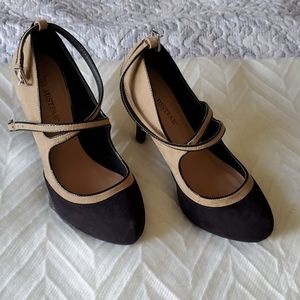 Black and tan faux suede criss cross pumps